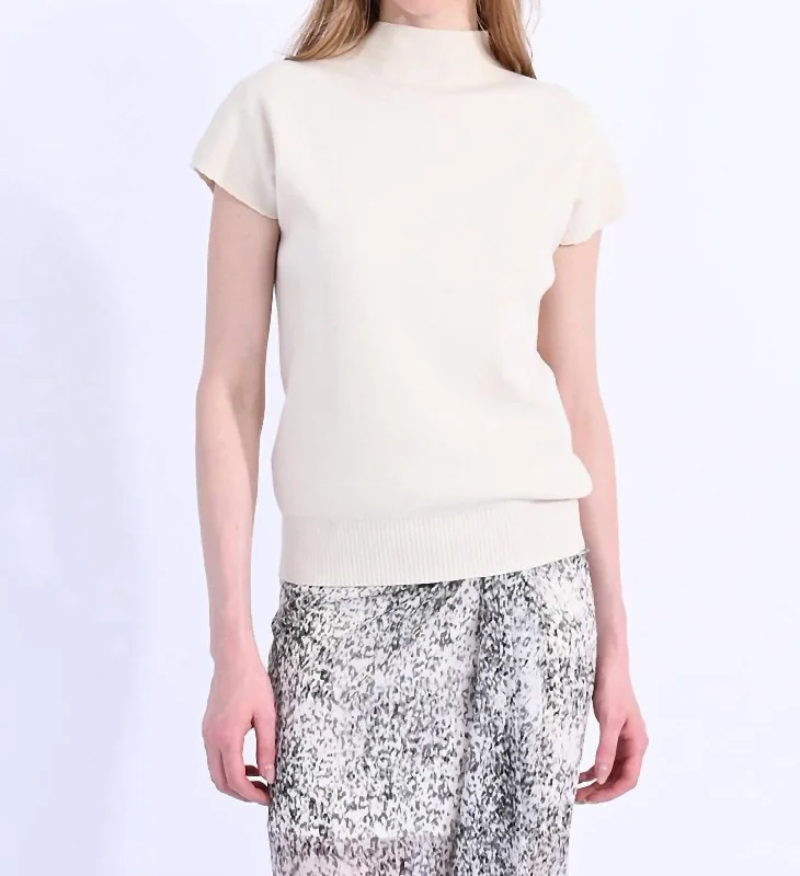 Knitted Capped Sleeveless Sweater In Cream